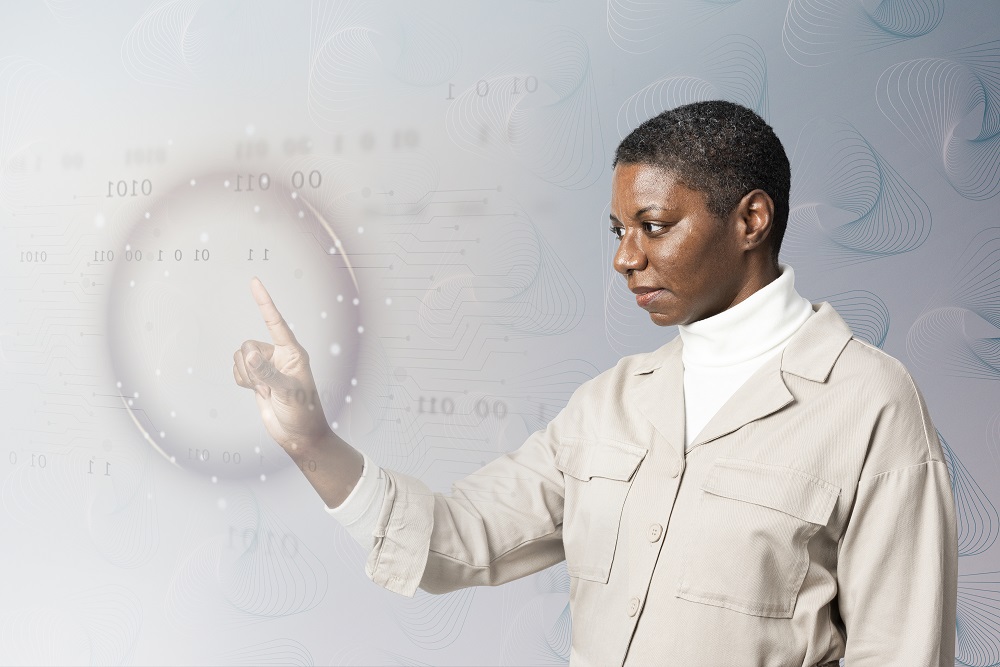 Woman analysing binary code on virtual screen in a virtual fair