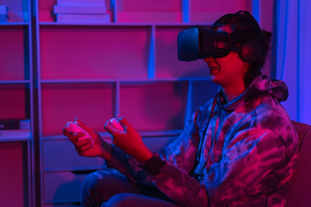 Metaverse technology concept, Man playing games with virtual reality.