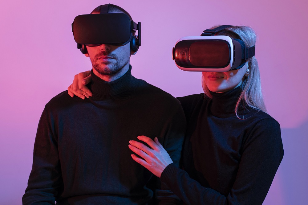 Couple with virtual reality glasses
