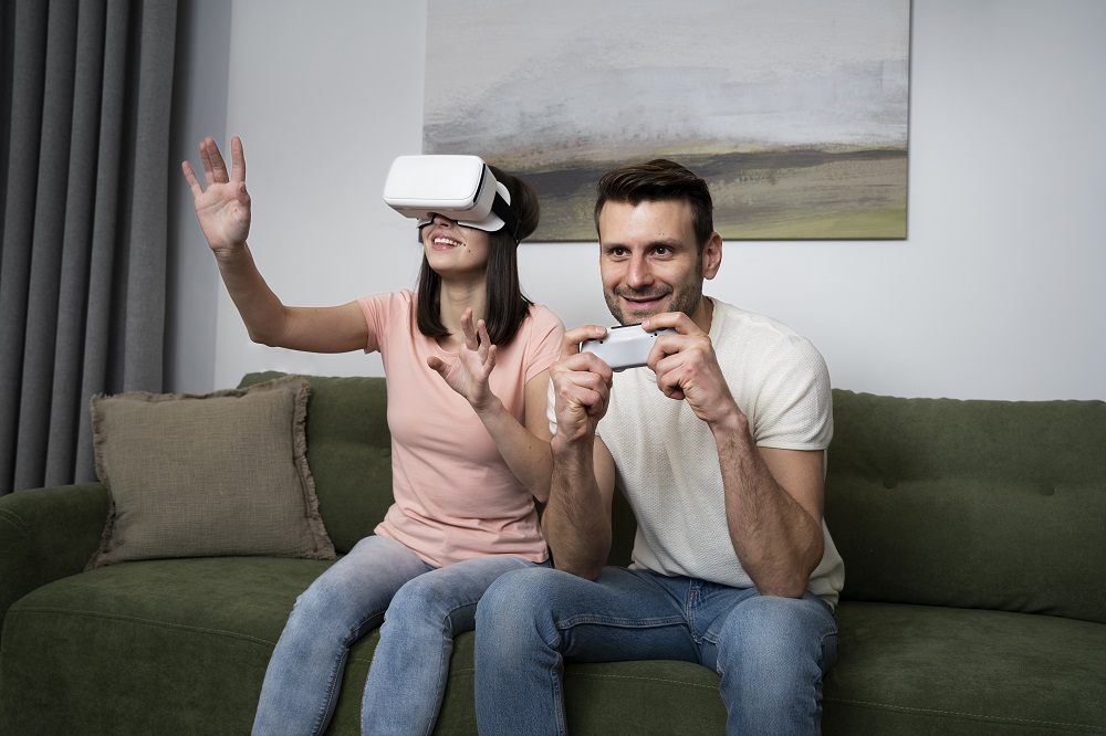 VR software development company/ couple plays in a VR app