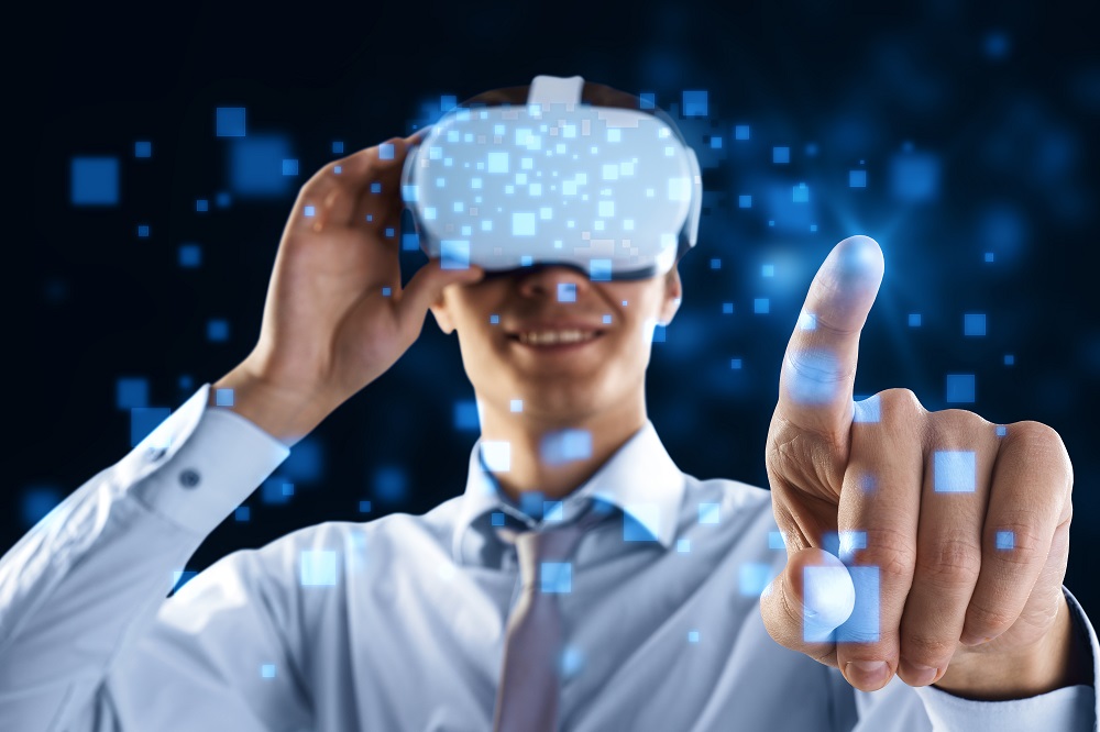 VR and cyberspace concept with young man in white shirt wearing modern headset touching metaverse virtual screen with digital pixels.